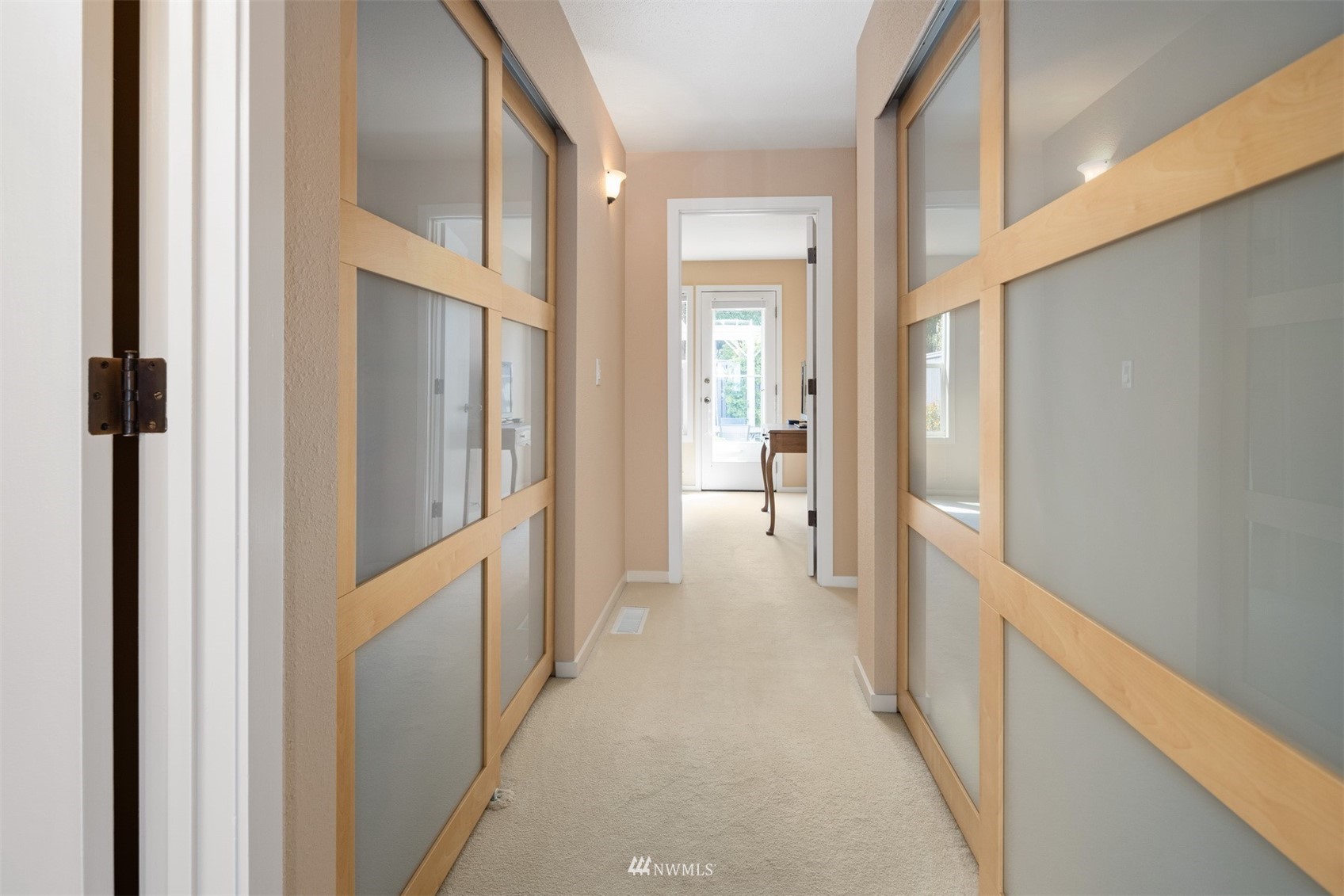627 Briar Road Bellingham, WA 98225 - Photo 18 of 40 a view of a hallway with a wooden door