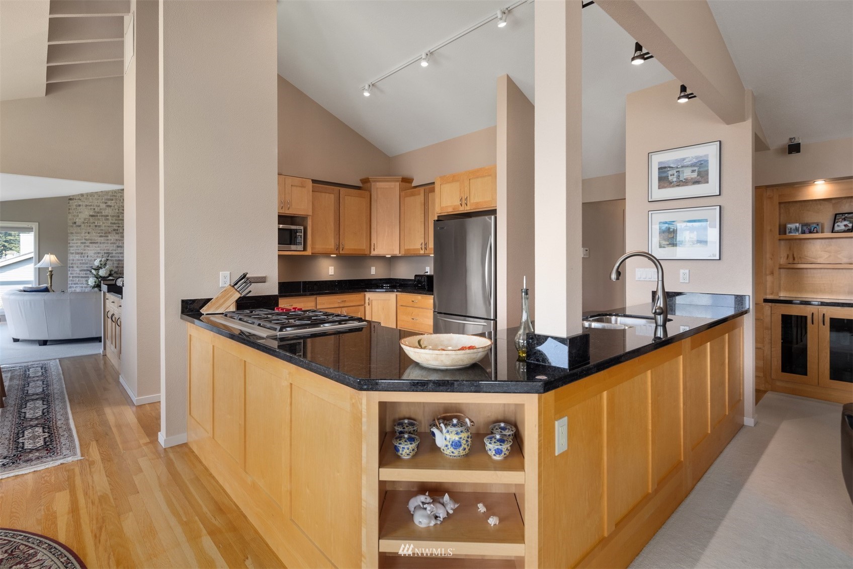 627 Briar Road Bellingham, WA 98225 - Photo 8 of 40 a kitchen with stainless steel appliances granite countertop a stove a sink and a refrigerator