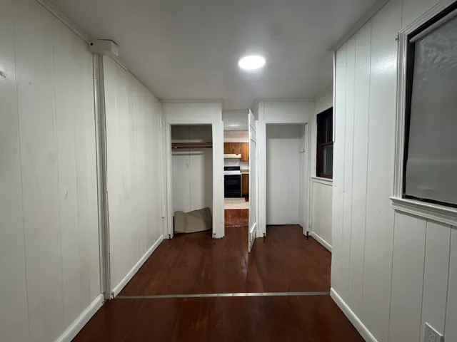 wooden floor in an empty room with an empty room
