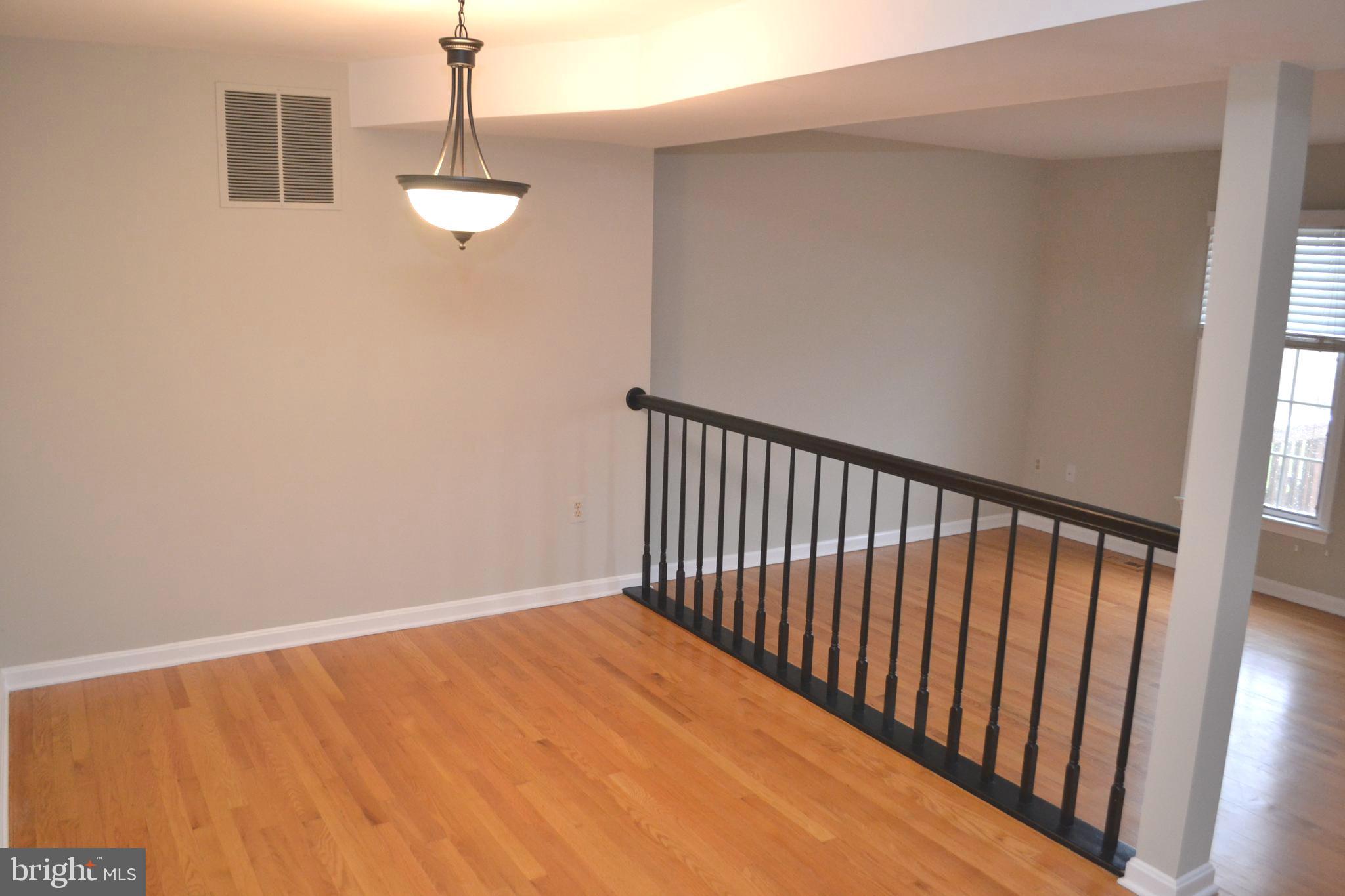 8019 Waterview Court Frederick, MD 21701 - Photo 11 of 56 Dinning room hardwood floors