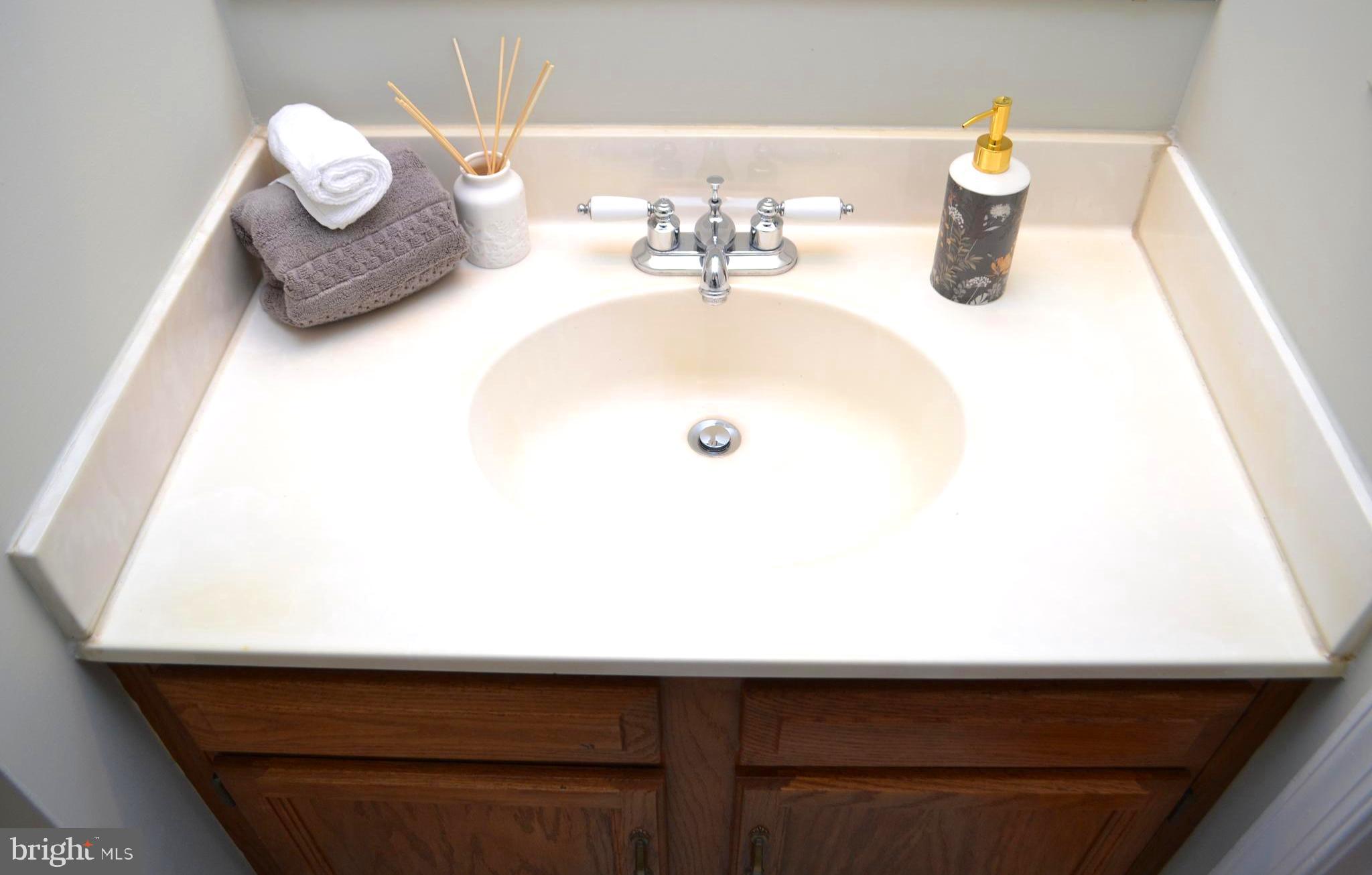 8019 Waterview Court Frederick, MD 21701 - Photo 16 of 56 Half bath sink on main level