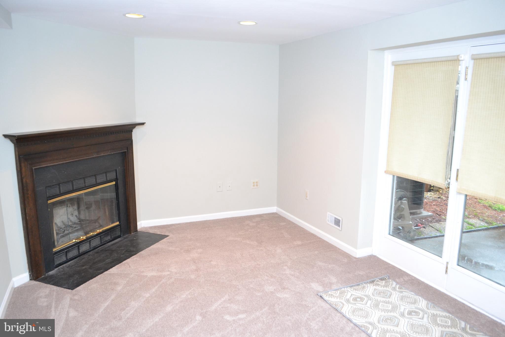 8019 Waterview Court Frederick, MD 21701 - Photo 49 of 56 Wood burning fireplace walk out Basement to Patio