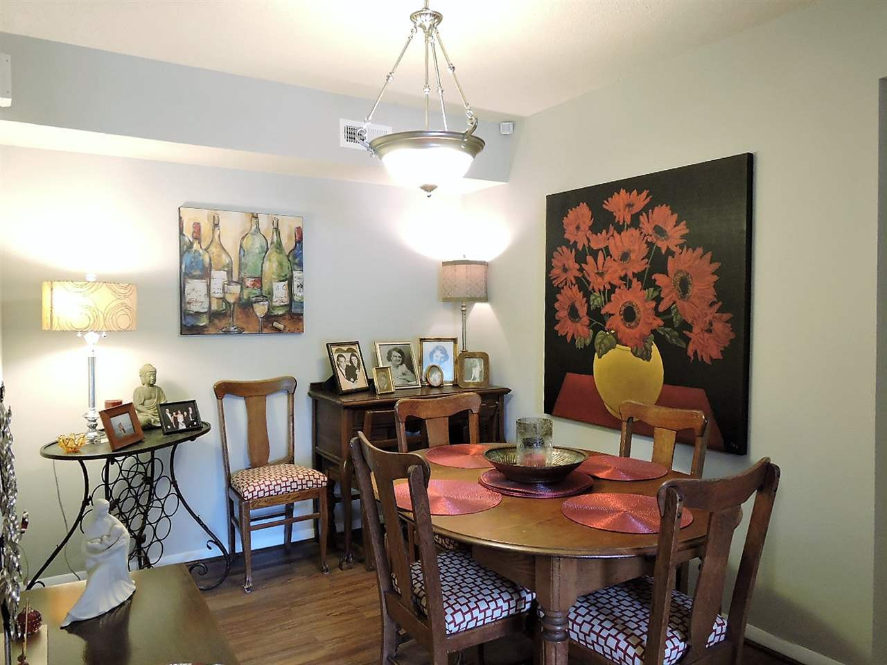 3702 Chimney Ridge Place, Unit 206 Durham, NC 27713 - Photo 12 of 19 a view of a dining room with furniture window and wooden floor