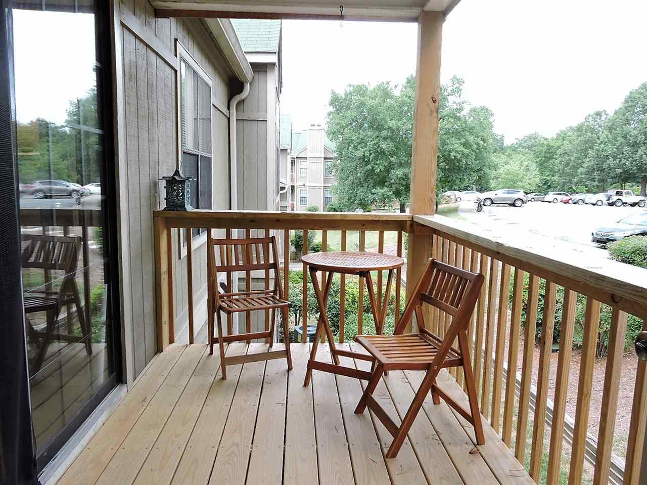 3702 Chimney Ridge Place, Unit 206 Durham, NC 27713 - Photo 17 of 19 a view of a balcony with wooden floor