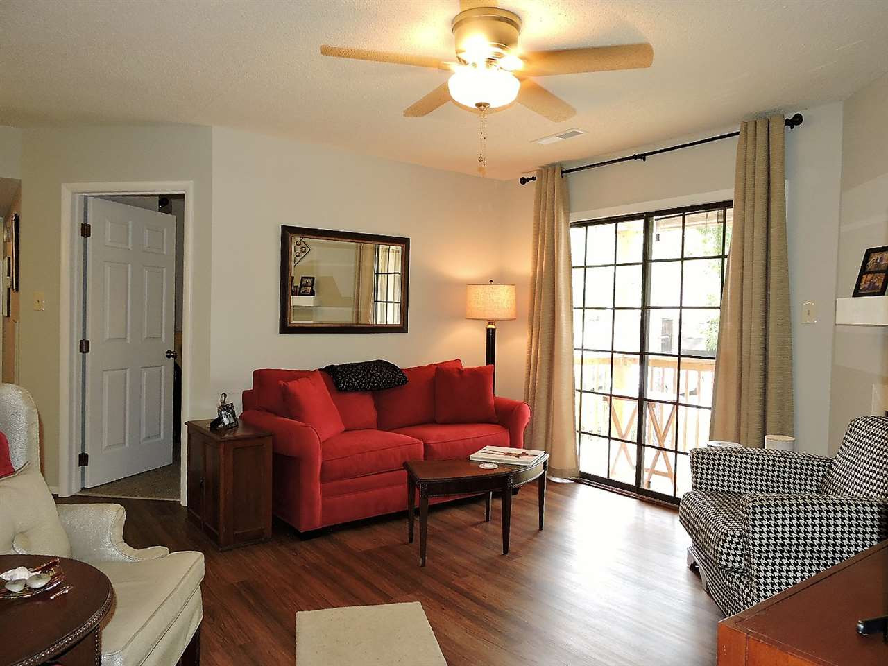 3702 Chimney Ridge Place, Unit 206 Durham, NC 27713 - Photo 2 of 19 a living room with furniture and a window