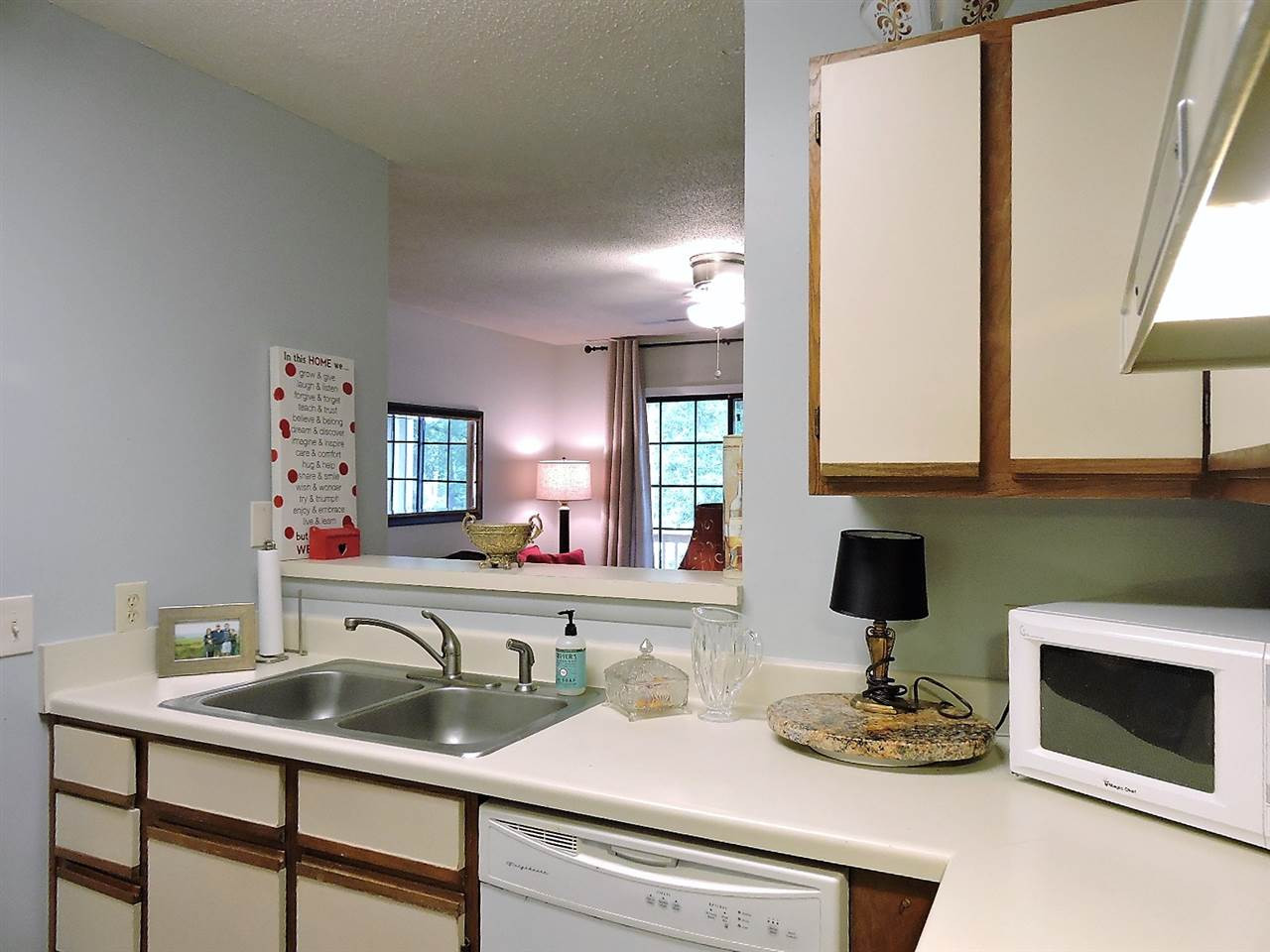 3702 Chimney Ridge Place, Unit 206 Durham, NC 27713 - Photo 7 of 19 a kitchen with sink and cabinets