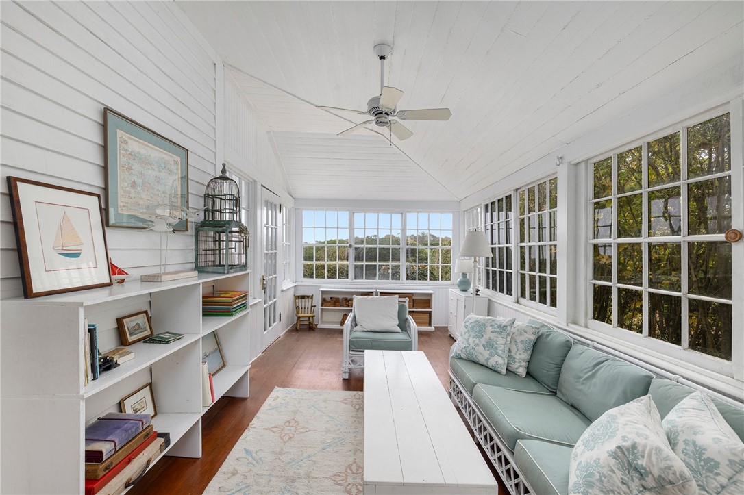 34 Emerson Road Jamestown, RI 02835 - Photo 19 of 45 The lovely sunroom is 20' x 7'3" and has access to the wraparound porch on one side and to the yard on the other side!