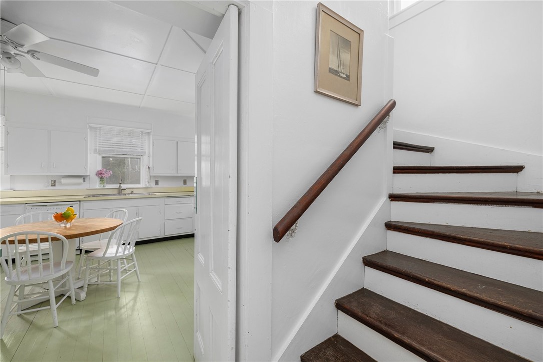 34 Emerson Road Jamestown, RI 02835 - Photo 25 of 45 Here is the back staircase to the second level, just off the kitchen.
