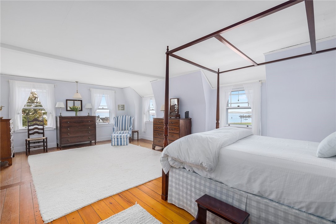 34 Emerson Road Jamestown, RI 02835 - Photo 31 of 45 The stunning primary en suite is 24'1" x 15'11", full of natural light and beautiful views.