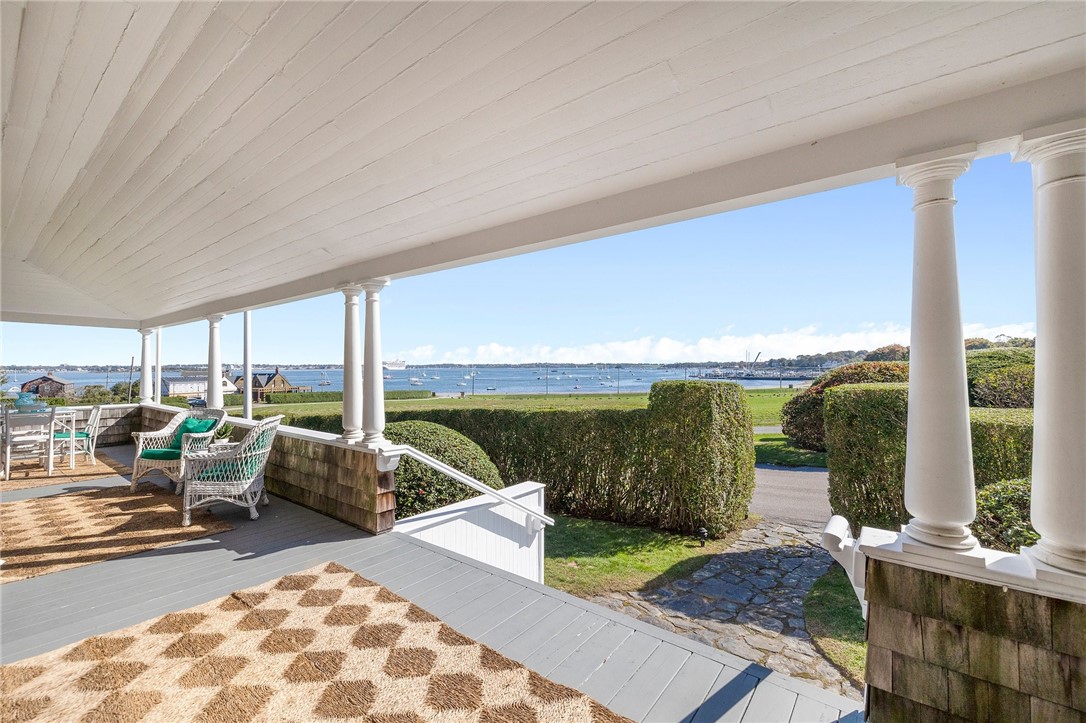 34 Emerson Road Jamestown, RI 02835 - Photo 7 of 45 The generous wraparound porch is perfect for relaxing, dining, and entertaining!