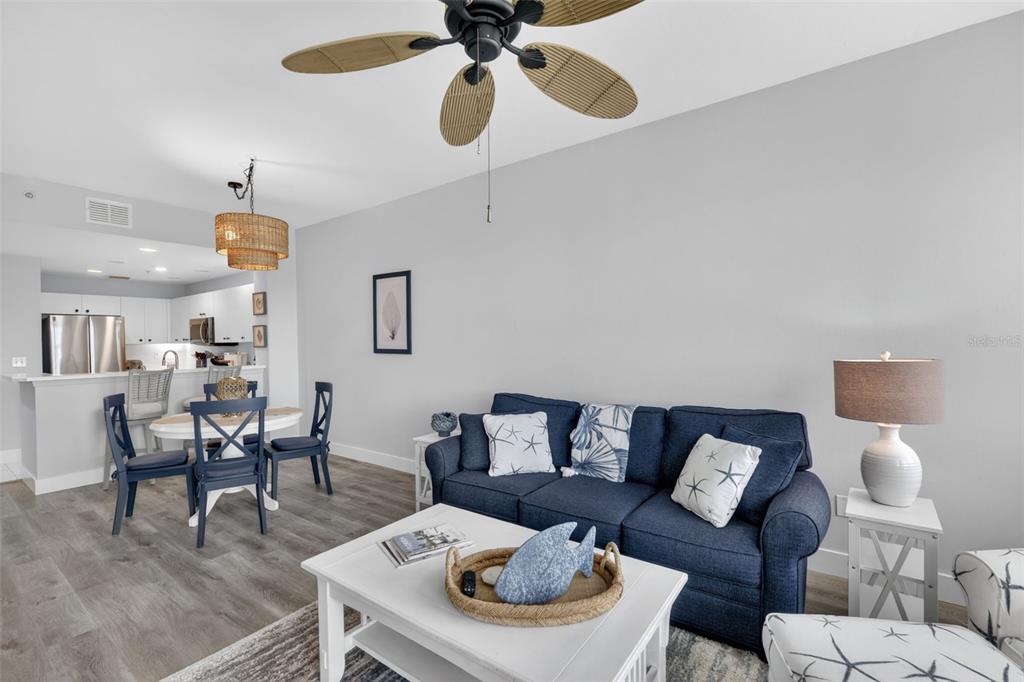 2090 Matecumbe Key Road, Unit 1603 Punta Gorda, FL 33955 - Photo 14 of 47 a living room with furniture and wooden floor