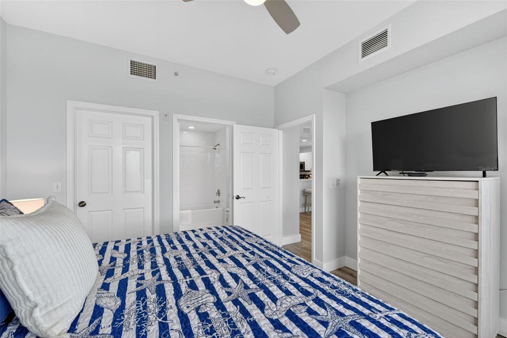 2090 Matecumbe Key Road, Unit 1603 Punta Gorda, FL 33955 - Photo 17 of 47 a bedroom with a bed and flat screen tv