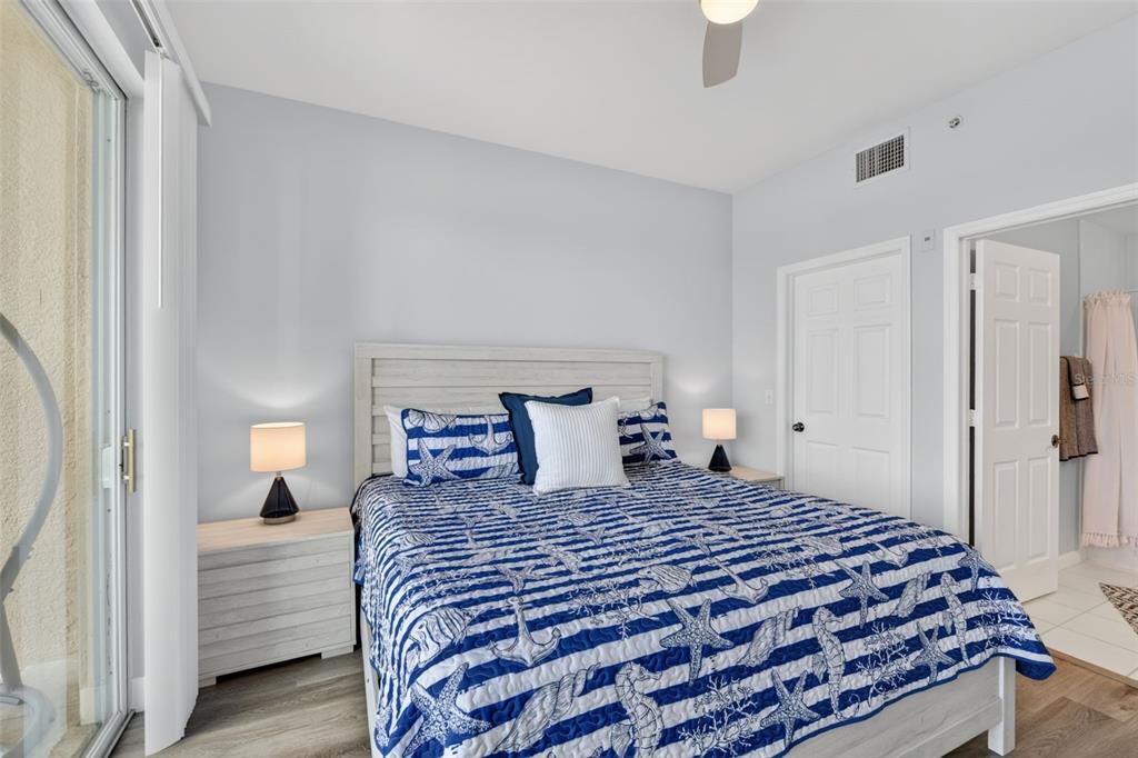 2090 Matecumbe Key Road, Unit 1603 Punta Gorda, FL 33955 - Photo 20 of 47 a bedroom with a large bed and a window