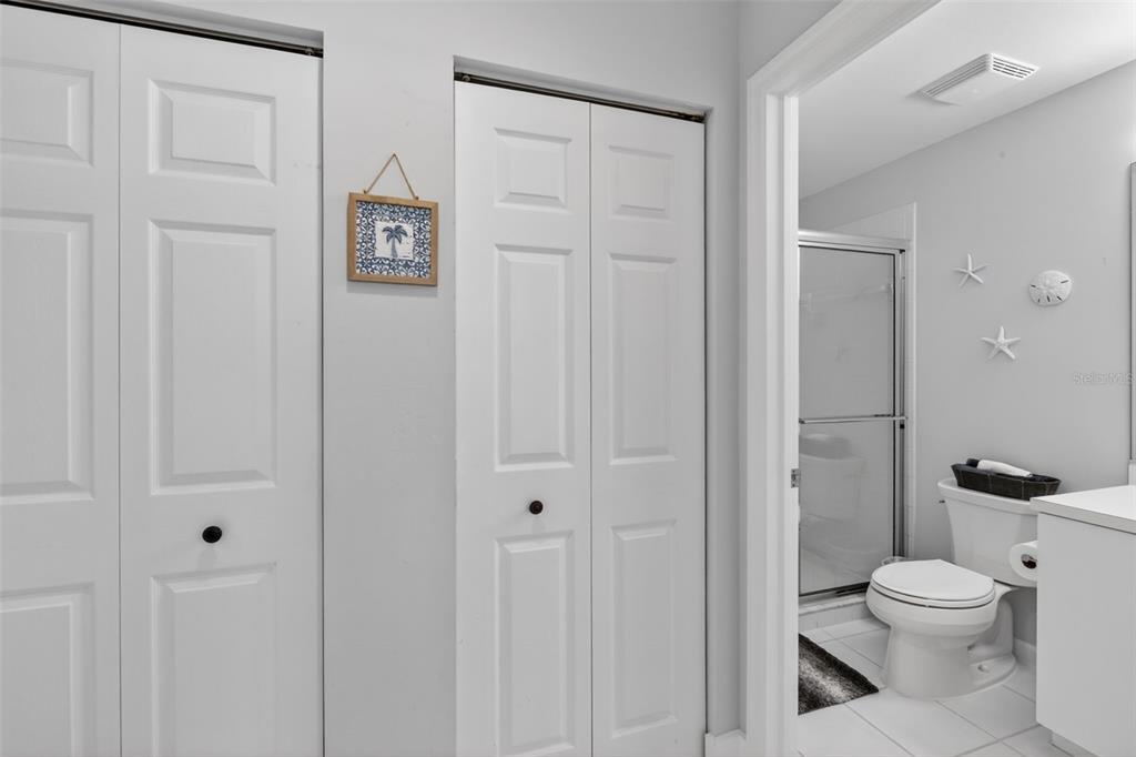 2090 Matecumbe Key Road, Unit 1603 Punta Gorda, FL 33955 - Photo 30 of 47 a white toilet sitting next to a bathroom sink