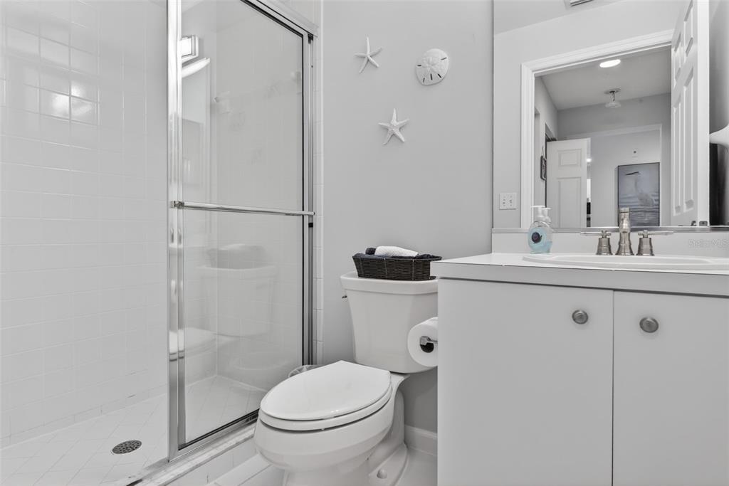 2090 Matecumbe Key Road, Unit 1603 Punta Gorda, FL 33955 - Photo 32 of 47 a bathroom with a sink toilet and shower