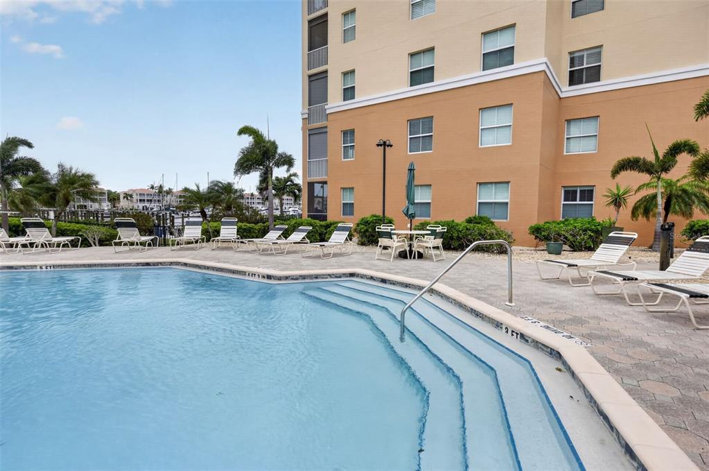 2090 Matecumbe Key Road, Unit 1603 Punta Gorda, FL 33955 - Photo 37 of 47 a building with view of palm trees