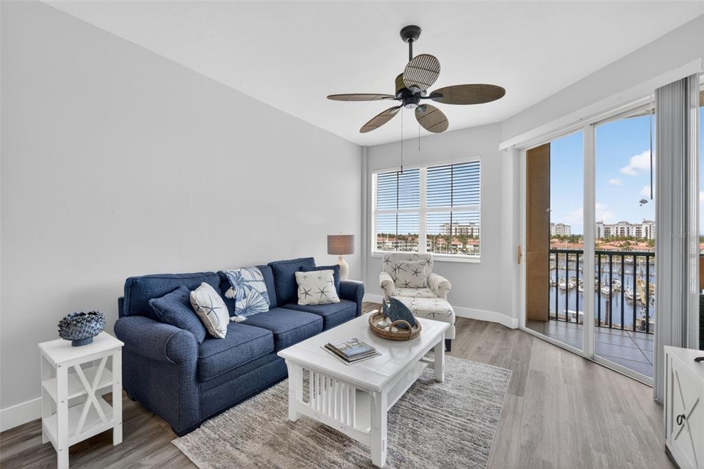 2090 Matecumbe Key Road, Unit 1603 Punta Gorda, FL 33955 - Photo 4 of 47 a living room with furniture and a large window