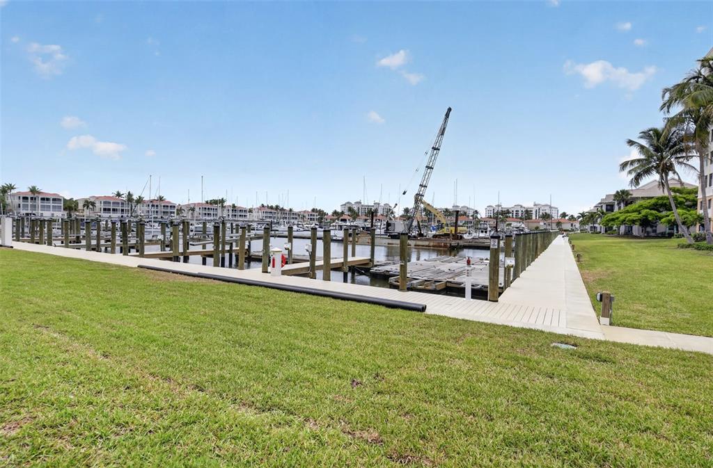 2090 Matecumbe Key Road, Unit 1603 Punta Gorda, FL 33955 - Photo 42 of 47 a view of a lake with houses in the background