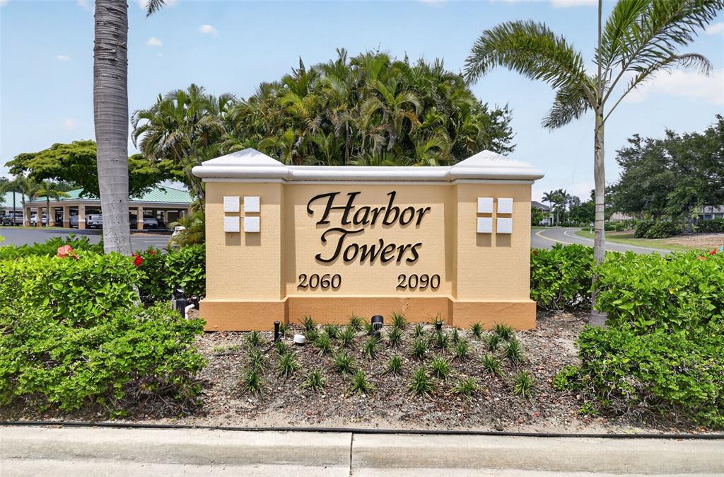 2090 Matecumbe Key Road, Unit 1603 Punta Gorda, FL 33955 - Photo 6 of 47 a sign on the side of a building
