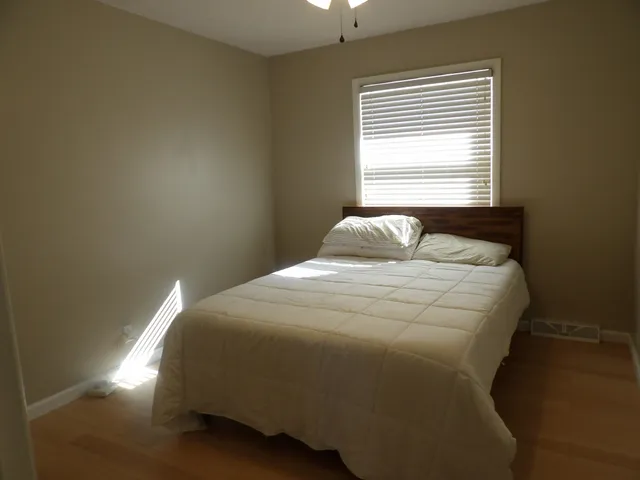 a view of a bathroom from a hallway