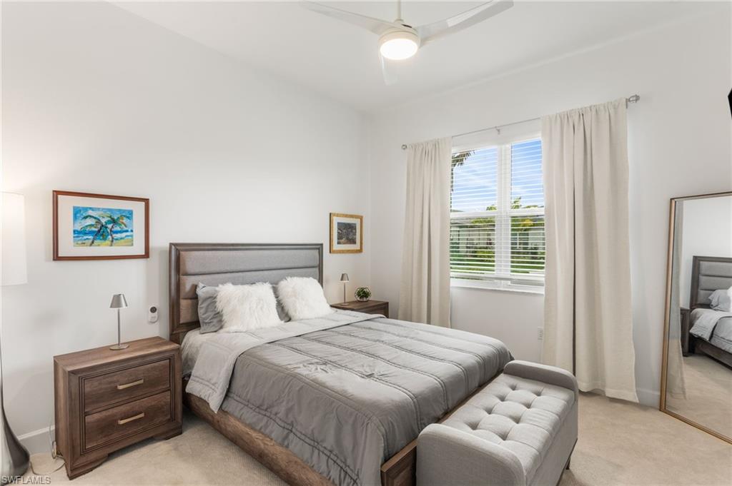 12370 Purple Ficus Way Naples, FL 34120 - Photo 24 of 50 Bedroom featuring light colored carpet and ceiling fan