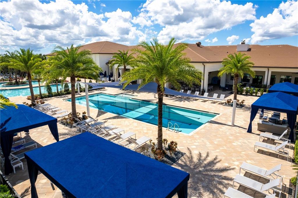 12370 Purple Ficus Way Naples, FL 34120 - Photo 47 of 50 Community pool featuring a patio area