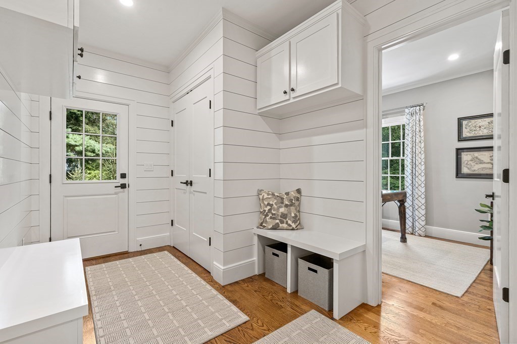 34 Willow Road Wellesley, MA 02482 - Photo 12 of 26 a living room with stainless steel appliances kitchen island granite countertop furniture and a rug