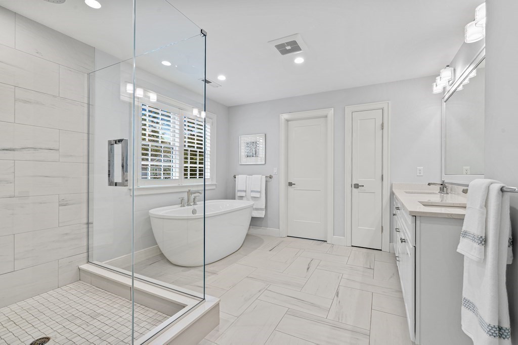 34 Willow Road Wellesley, MA 02482 - Photo 14 of 26 a living room with a couch and a table