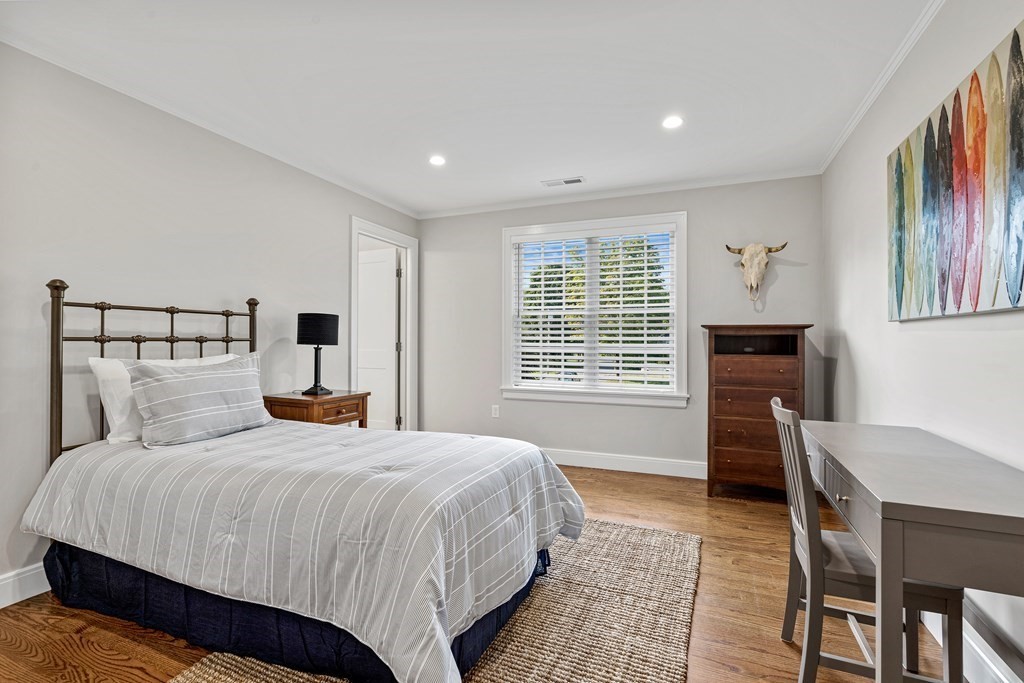 34 Willow Road Wellesley, MA 02482 - Photo 18 of 26 a bedroom with a large bed and furniture