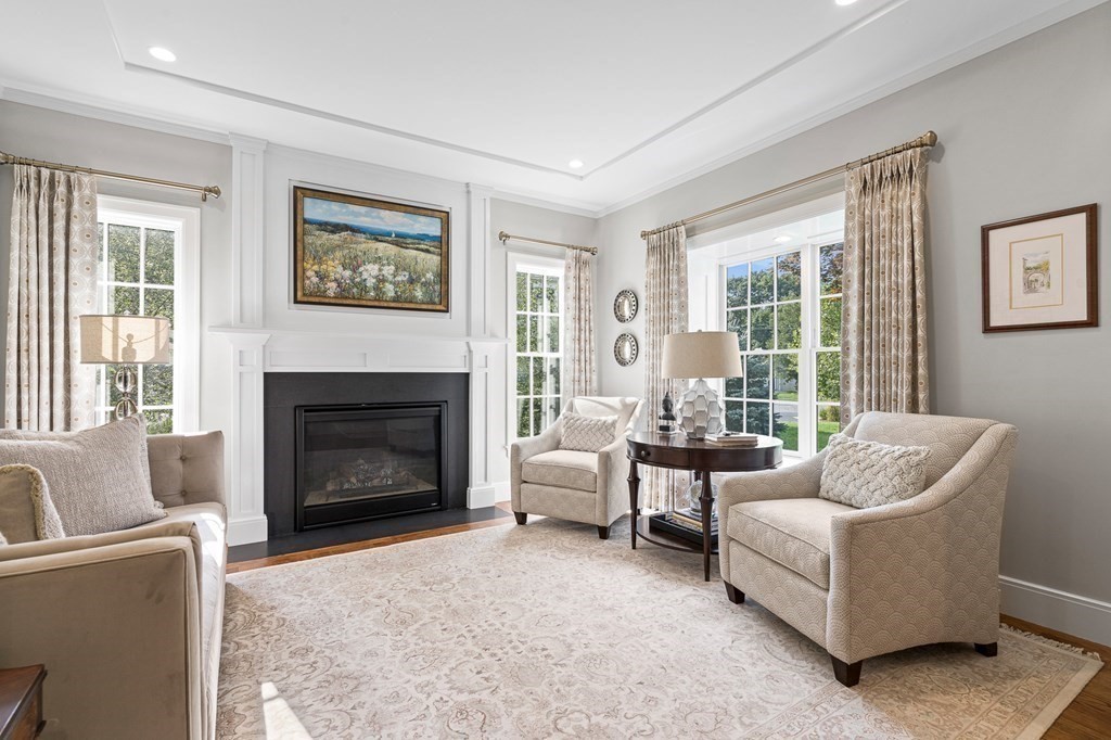 34 Willow Road Wellesley, MA 02482 - Photo 2 of 26 a living room with furniture and a fireplace