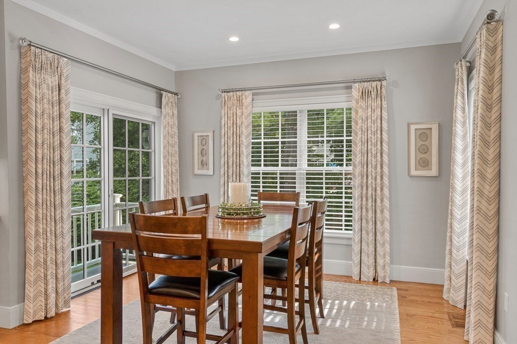 34 Willow Road Wellesley, MA 02482 - Photo 8 of 26 a view of a dining room with furniture and windows