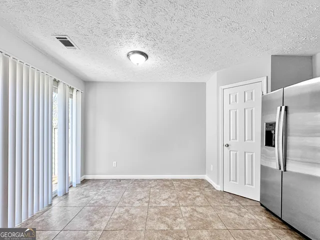 a view of a livingroom with an empty space