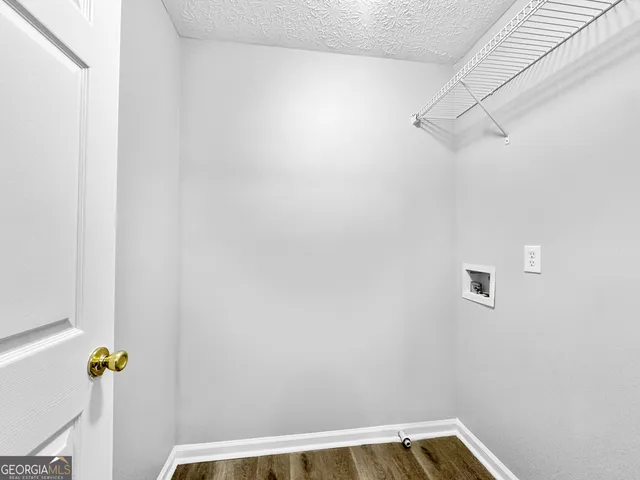 a view of small space with racks on the wall