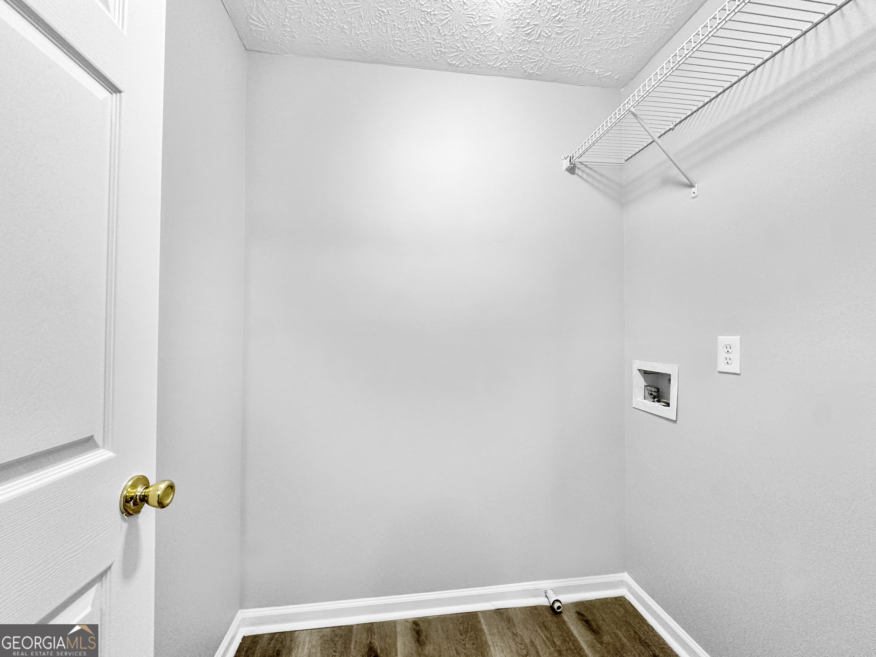 4045 Springvale Way McDonough, GA 30252 - Photo 9 of 18 a view of small space with racks on the wall