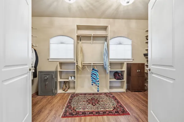a living room with furniture and a rug