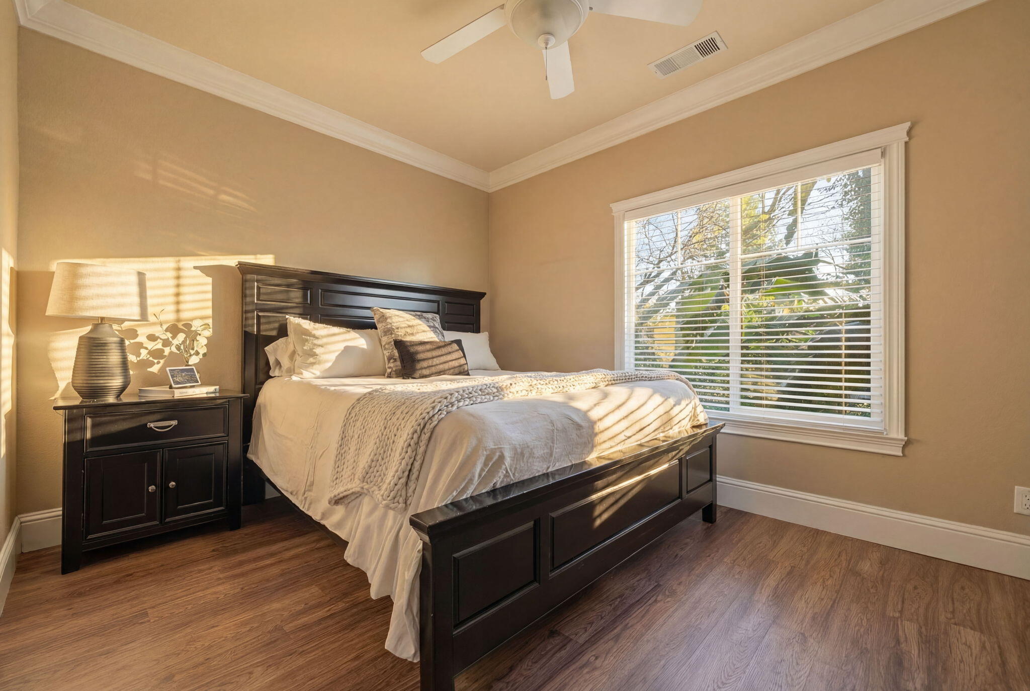 13380 Tierra Heights Road Redding, CA 96003 - Photo 20 of 35 a bed sitting in a bedroom next to a window