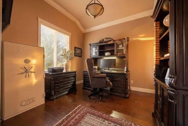 a view of workspace with furniture and windows