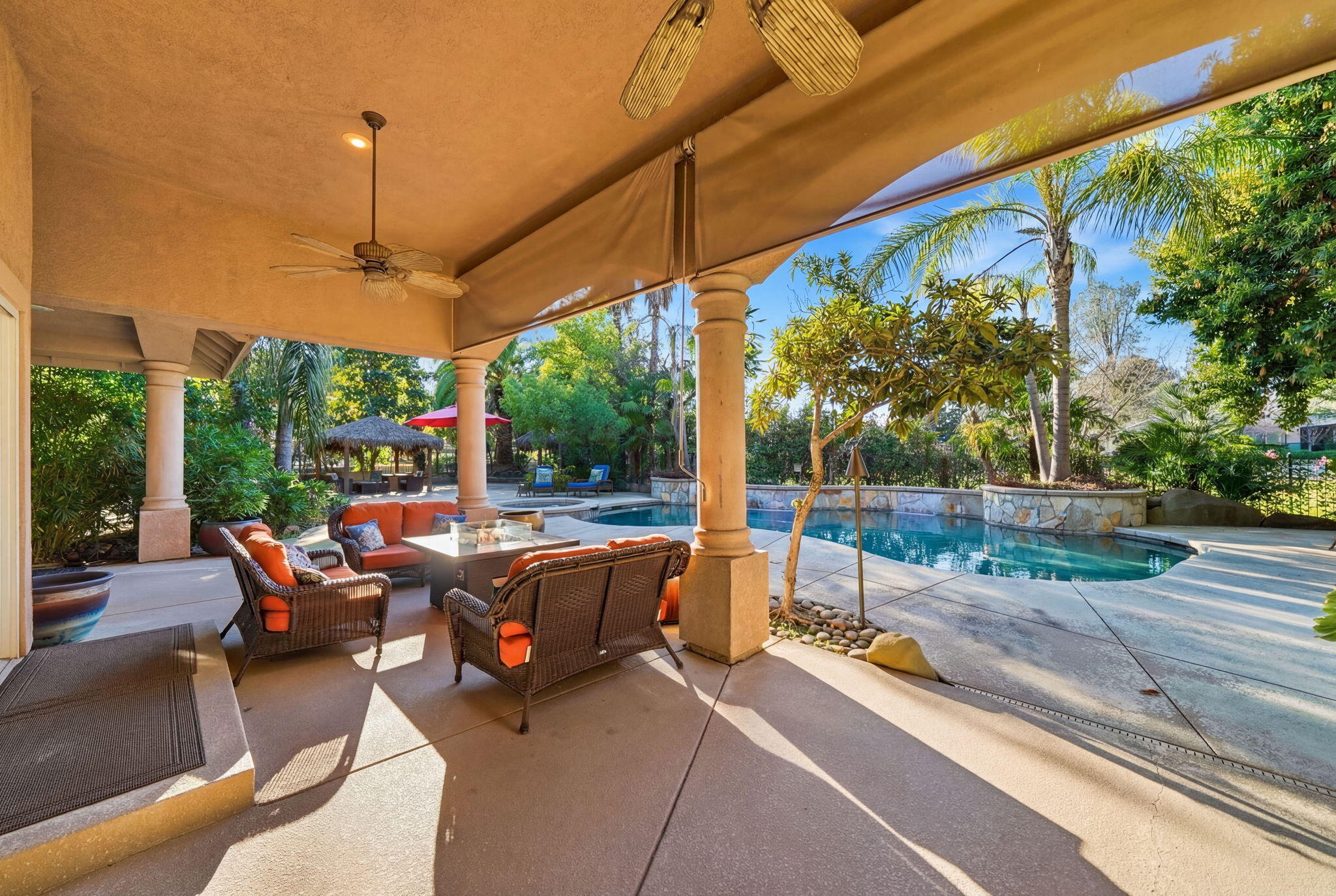 13380 Tierra Heights Road Redding, CA 96003 - Photo 26 of 35 a view of a patio with a table chairs and a floor to ceiling window