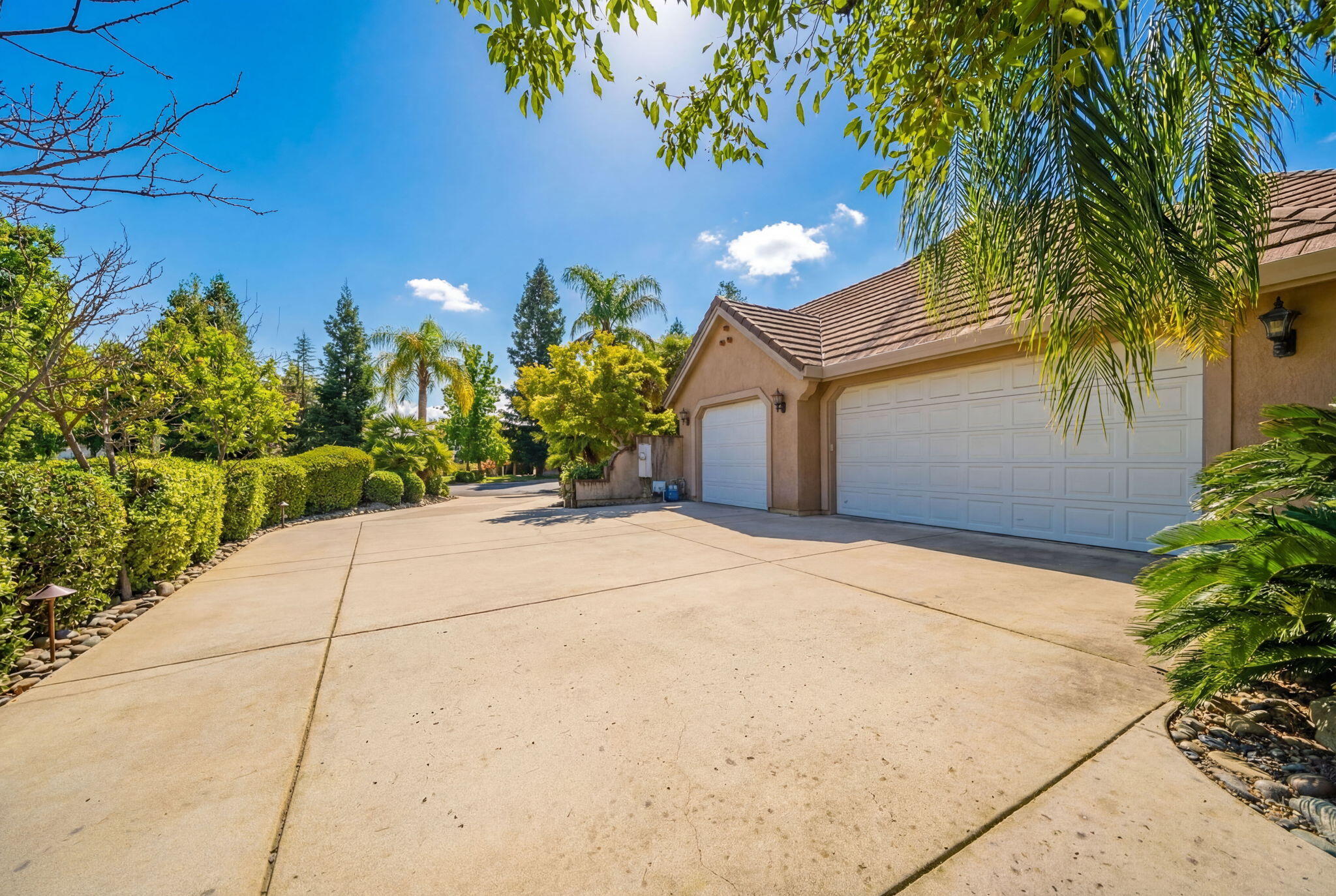 13380 Tierra Heights Road Redding, CA 96003 - Photo 34 of 35 a view of a house with a yard and potted plants