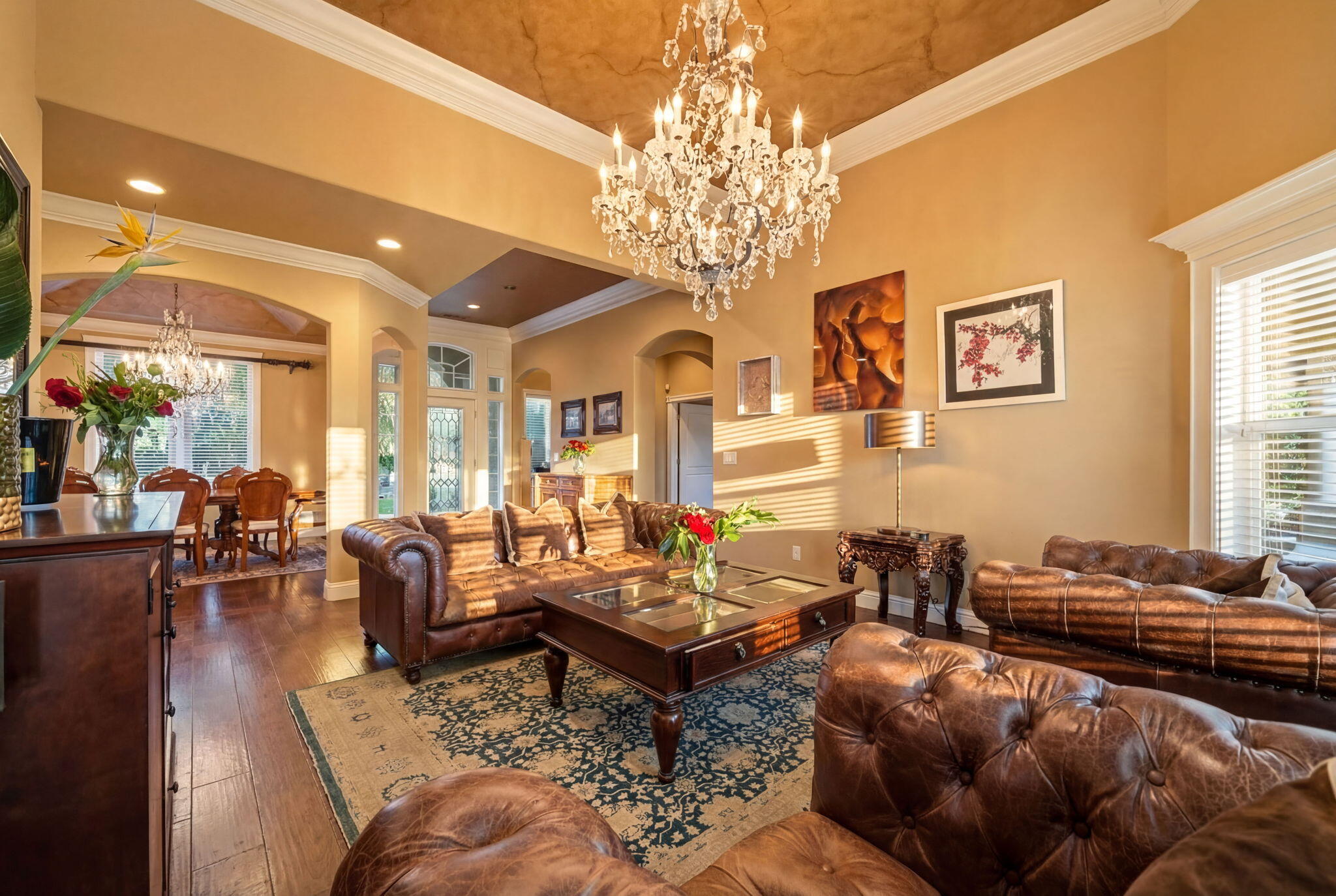 13380 Tierra Heights Road Redding, CA 96003 - Photo 4 of 35 a living room with furniture a chandelier and a dining table