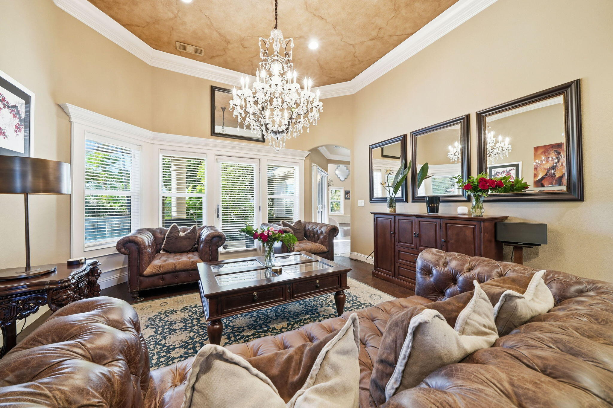 13380 Tierra Heights Road Redding, CA 96003 - Photo 5 of 35 a living room with furniture and a chandelier