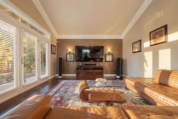 a lobby with furniture and a large window