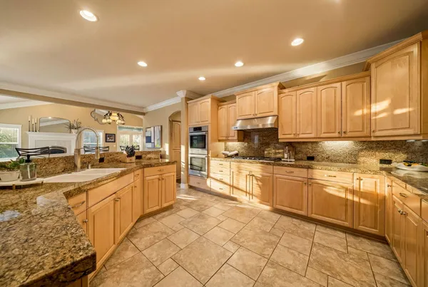 a large kitchen with cabinets