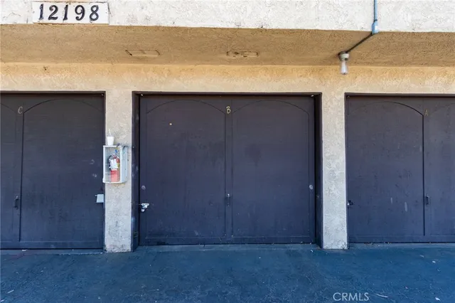an empty room with wooden door
