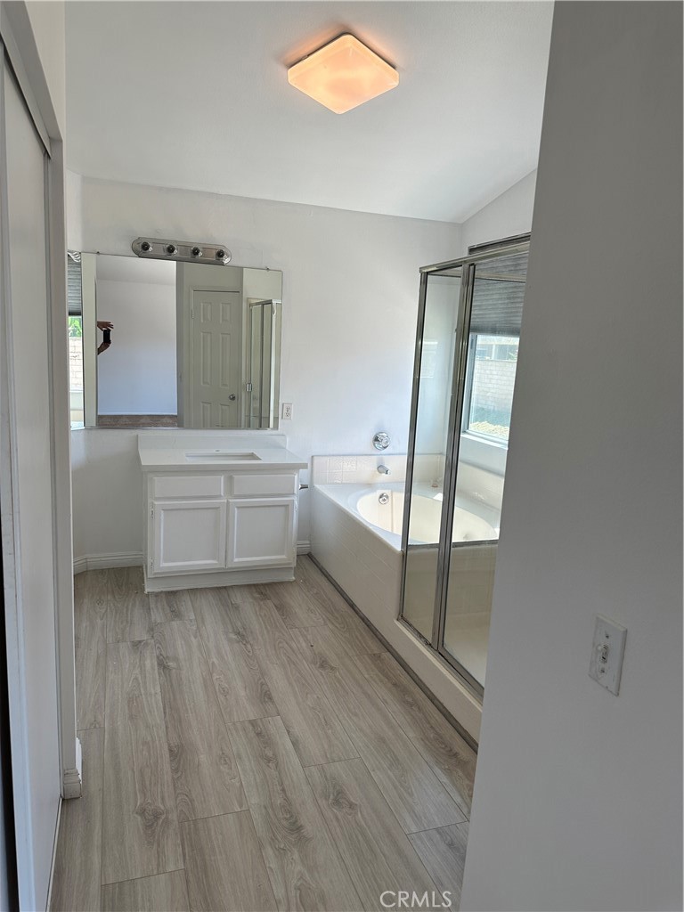 2342 Fitzgerald Road Simi Valley, CA 93065 - Photo 16 of 27 a bathroom with a bathtub and a sink