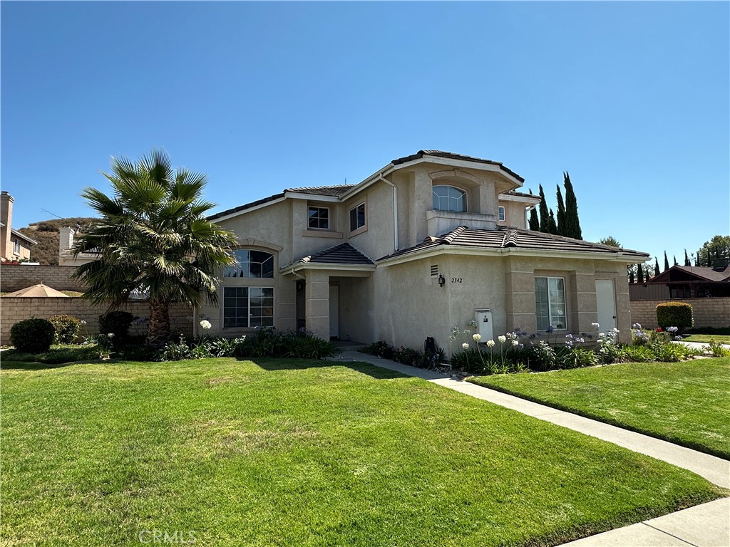 2342 Fitzgerald Road Simi Valley, CA 93065 - Photo 26 of 27 a front view of a house with garden
