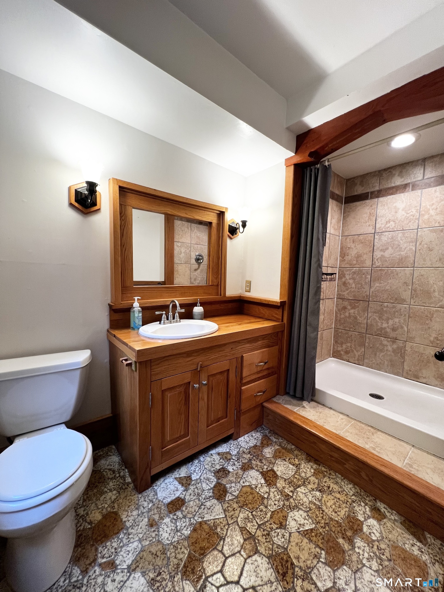 38 Clark Hill Road East Haddam, CT 06423 - Photo 21 of 35 a bathroom with a granite countertop toilet sink and mirror