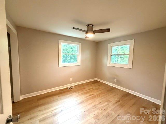 1450 3rd Street Southwest Hickory, NC 28602 - Photo 6 of 17 a view of an empty room with a window