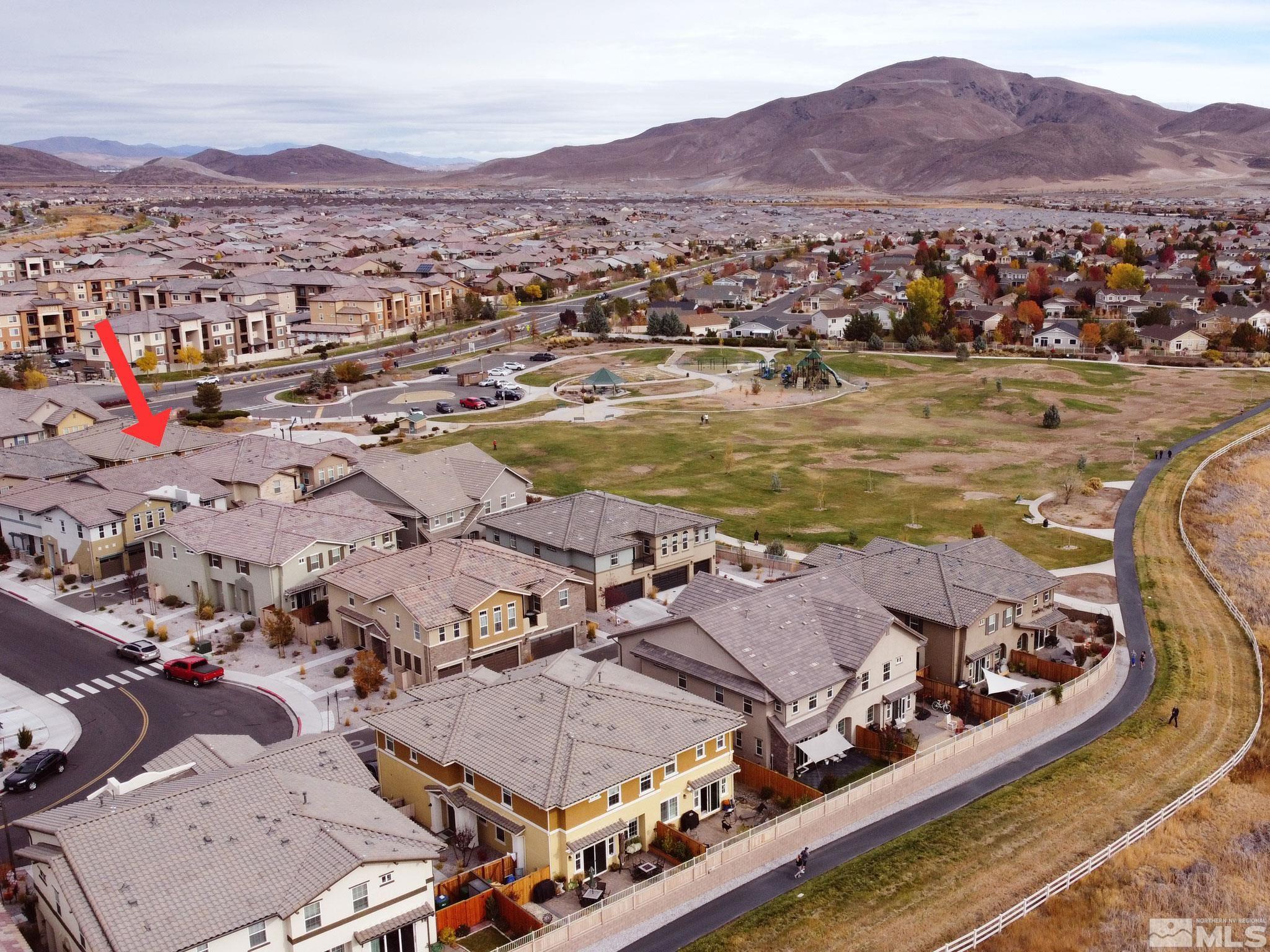 2025 Wind Ranch Road, Unit C Reno, NV 89521 - Photo 29 of 31 a view of a city with mountains in the background