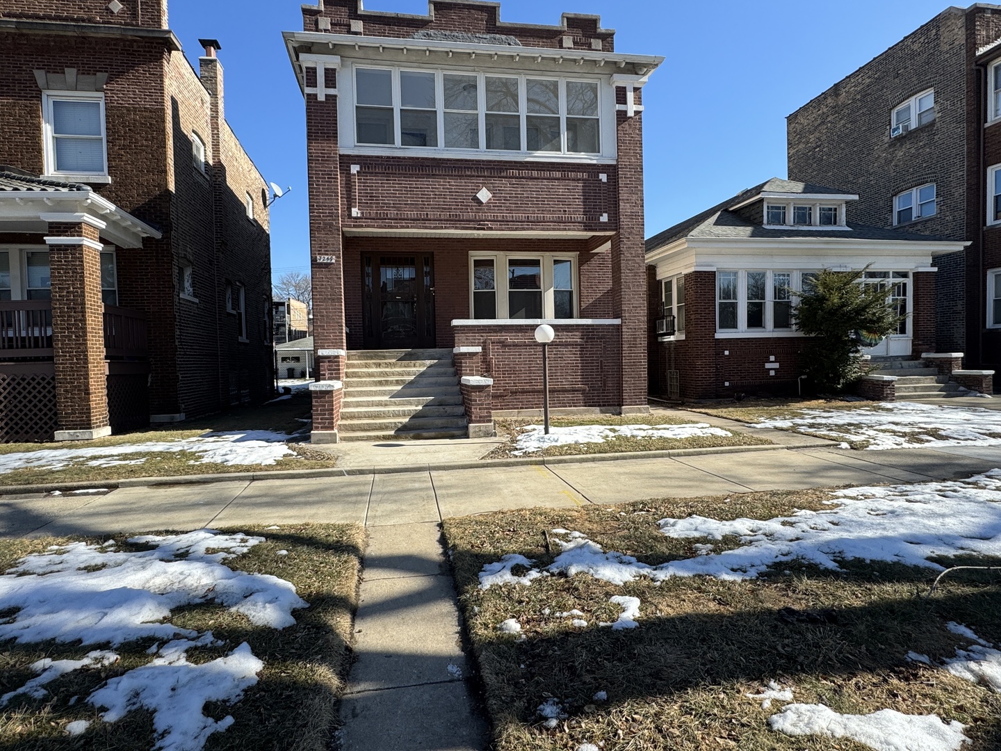 7249 South Calumet Avenue Chicago, IL 60619 - Photo 1 of 14